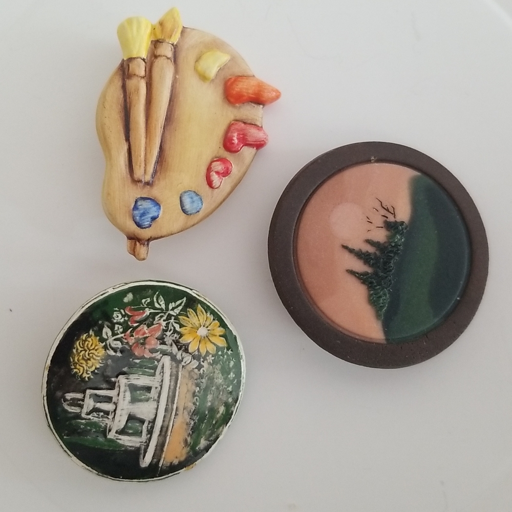 Three vintage brooches